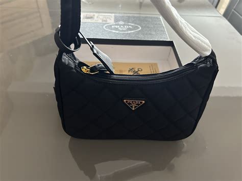 prada torebka mała|Prada torebek.